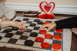 Parkside memory care residents playing cards in Port Charlotte